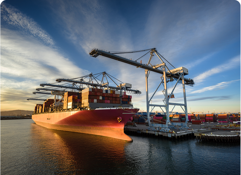 Container ship unloading at harbor